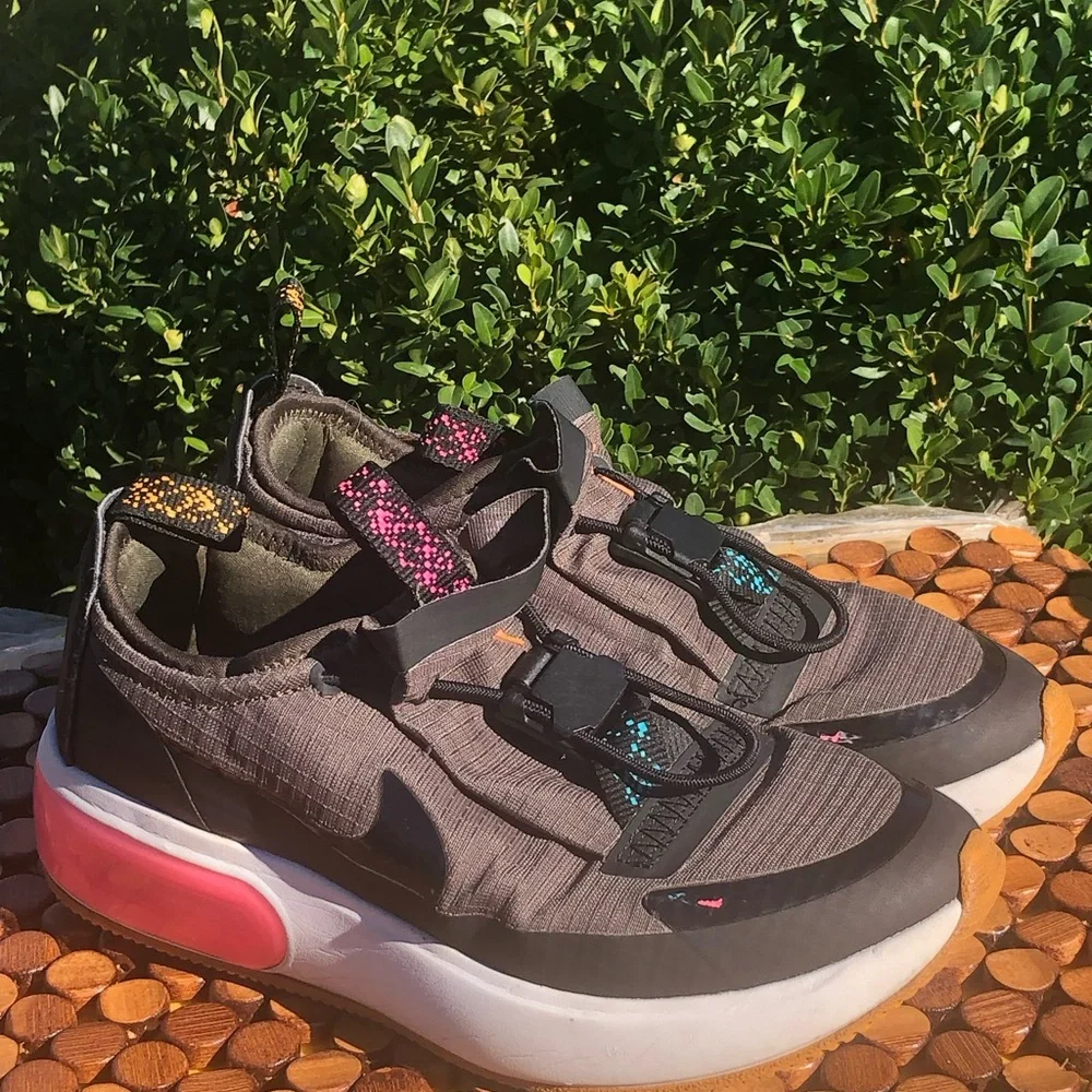 Nike Kids Gray Slip-On Sneakers with Pink Heel Accent